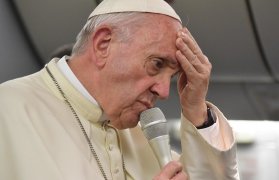 Francis speaking in an airplane